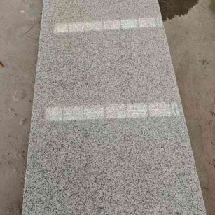 惠州芝麻白光面毛板